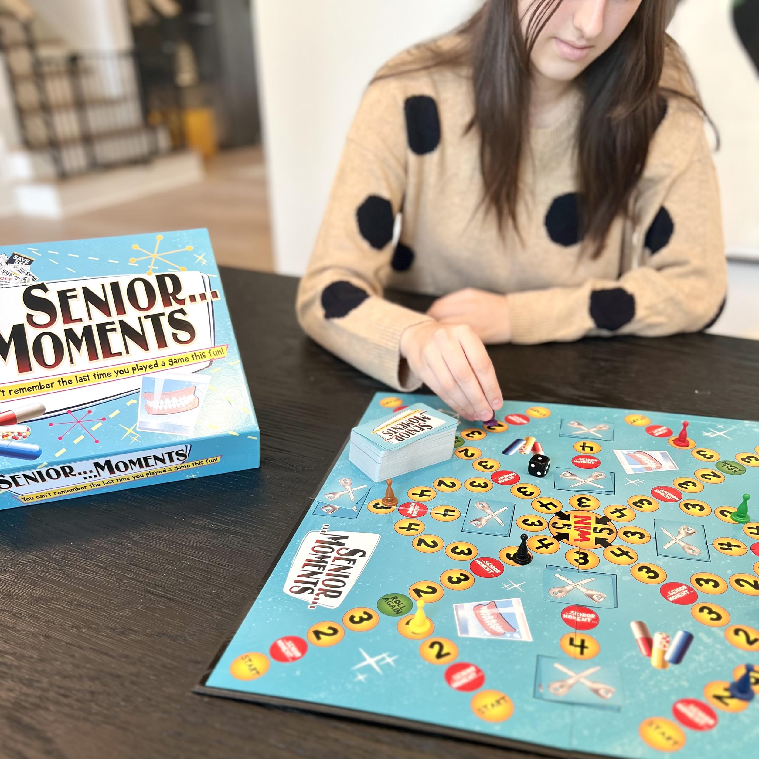 TDC Games Senior Moments cards: colorful prompts to challenge memory during game night.