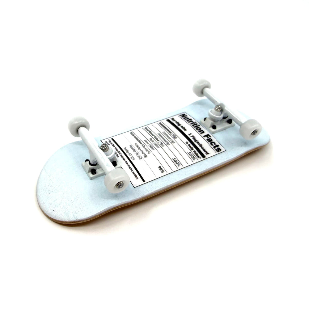Teak Tuning Prodigy Trucks in white enhance turning stability and consistency.