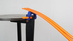 TechConnext table clamp securing the track to a table.