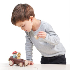 Tender Leaf Timber Taxi wheels roll smoothly for push-along fun.