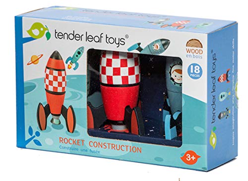 Tender Leaf Toys child building rockets encourages cooperative play and sharing.