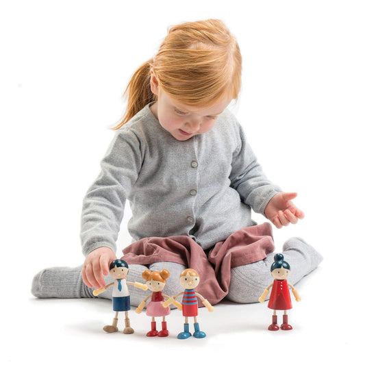 Tender Leaf Toys wooden dolls with flexible limbs for varied poses.
