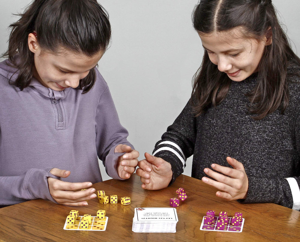 TENZI dice rolling action highlights fast reactions and lively play.