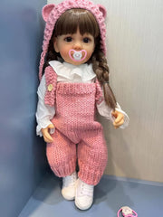 TERABITHIA 22-inch brown-haired full-body doll, poseable for lifelike posing.