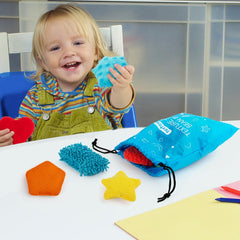 teytoy build fine motor skills by picking up and tossing bean bags
