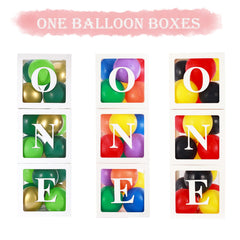 TGMMC ONE letters decor on white box spelling O N E for photo-ready milestone