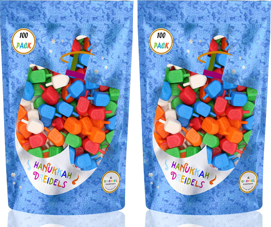 The Dreidel Company dreidels multicolor colors highlight foil-embossed Hebrew letters with translations.