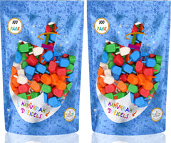 The Dreidel Company dreidels multicolor colors highlight foil-embossed Hebrew letters with translations.