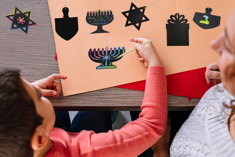 Kids enjoy a Hanukkah party game with The Dreidel Company.