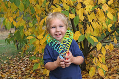 Colorful Dreidel Company coil spring toy suitable for goody bags