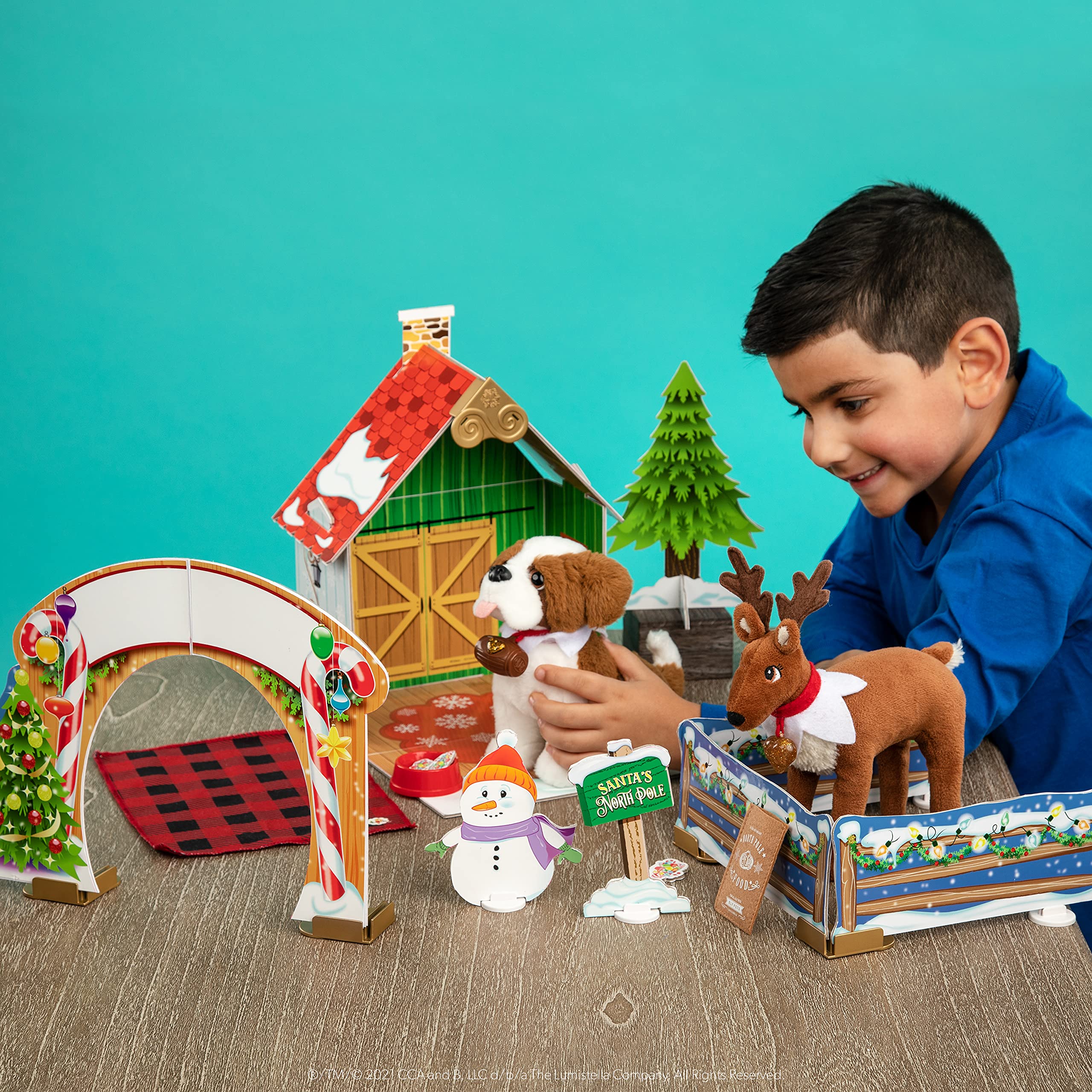 The Elf on the Shelf Cabin Playset packaging detail highlights compact dimensions.