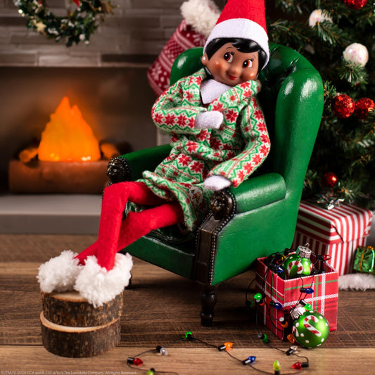 The Elf on the Shelf Claus Couture Slippers keep your elf comfy during bedtime setups.
