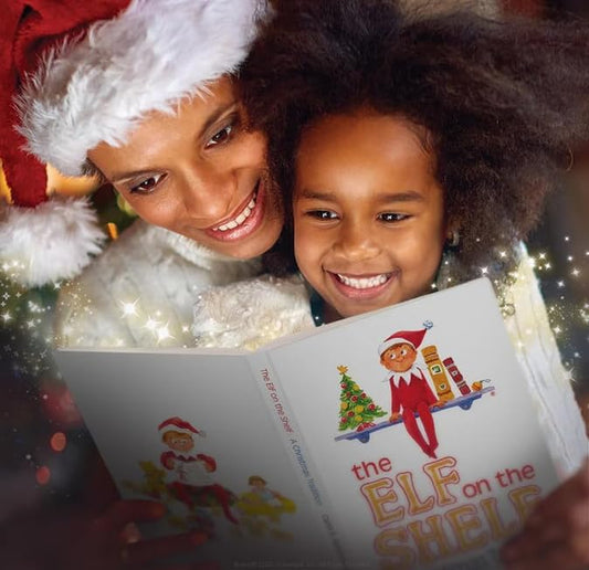 The Elf on the Shelf silver tinsel dress adds festive sparkle to playtime.