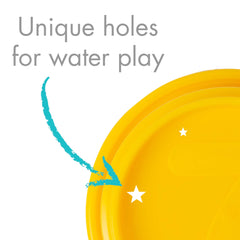 The First Years cup being used in a bathtub showing sensory splashing benefits