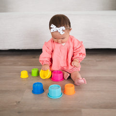 The First Years nested cups demonstrating compact storage and portability
