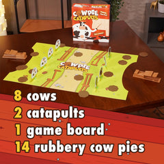 The Good Game Company Cowpie Catapults game board showing cows ready to topple.