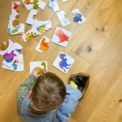 The Learning Journey pieces next to a child’s hand showing child-friendly scale
