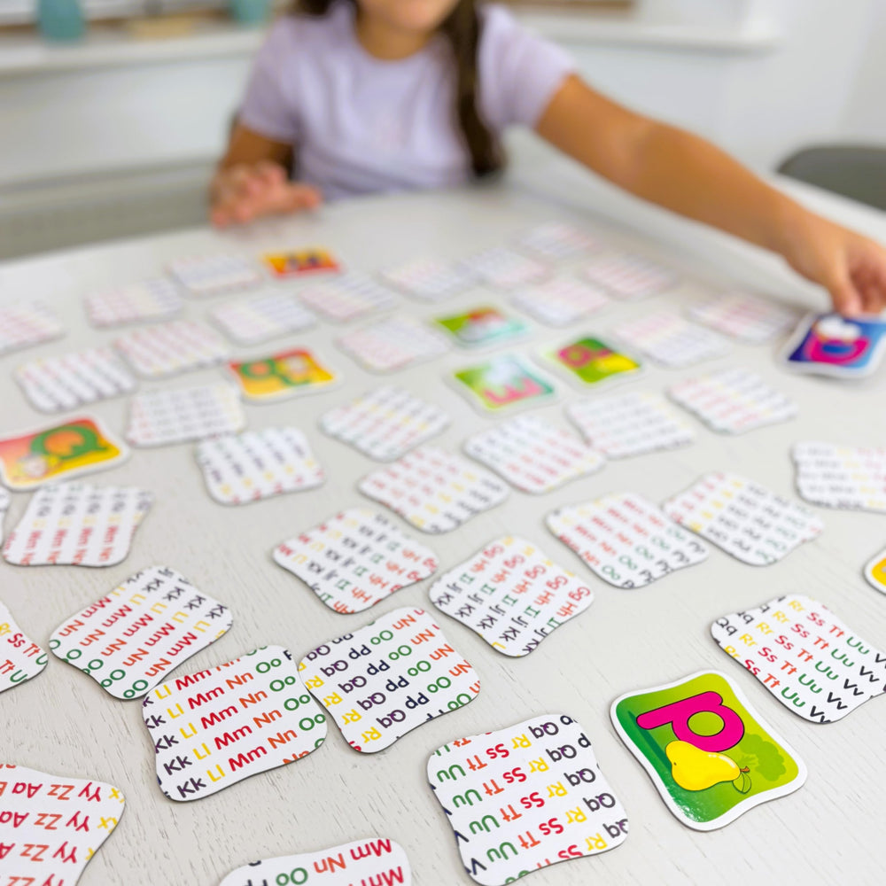 The Learning Journey size comparison in a hand showing compact, travel-friendly card set