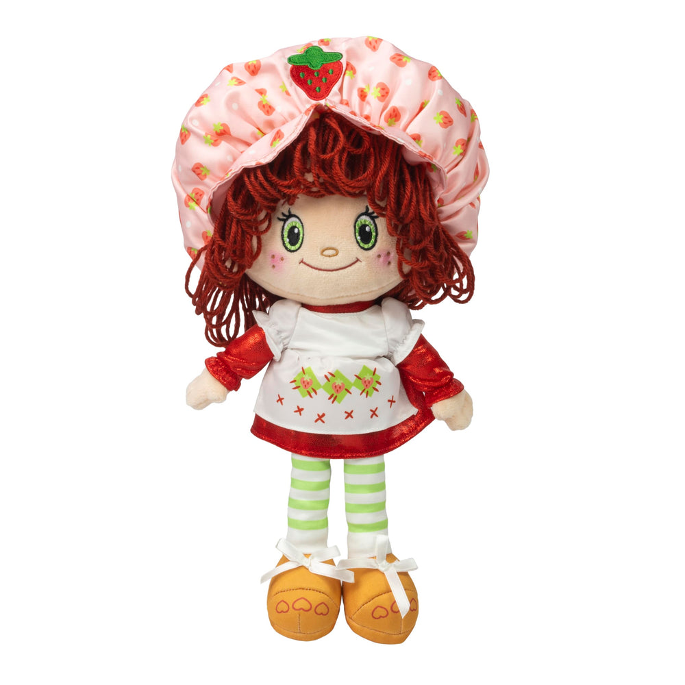 The Loyal Subjects Strawberry Shortcake 14-inch doll with glittery outfit for imaginative play.