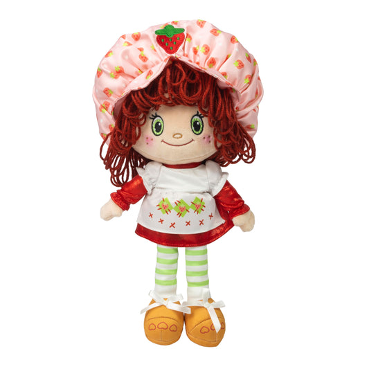 The Loyal Subjects Strawberry Shortcake 14-inch doll with glittery outfit for imaginative play.