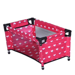 The New York Doll Collection doll Fold n' Store Pack n' Play with hearts for pretend bedtime.