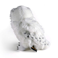 The Noble Collection Hedwig plush with official logo tag, authentic merchandise.