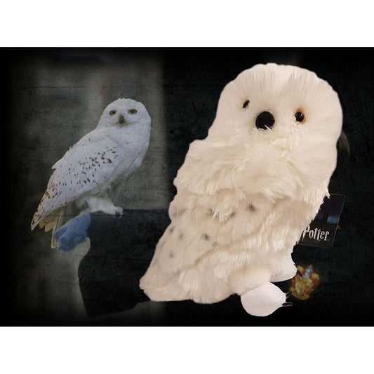 The Noble Collection Hedwig plush side view, ideal desk companion.