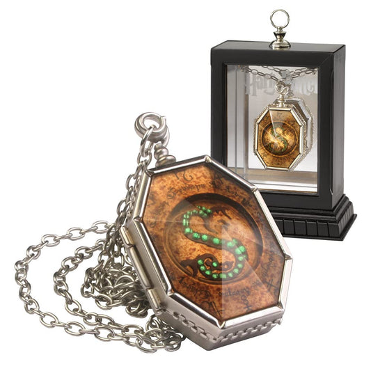 The Noble Collection Horcrux Locket emblem close-up for precise display.