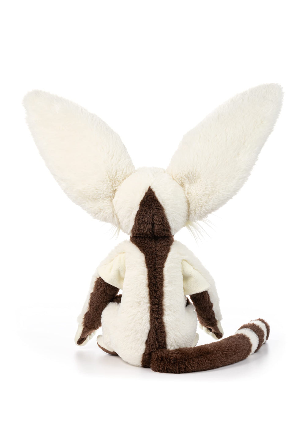 The Noble Collection Momo plush on a shelf scene makes a fan-ready display.