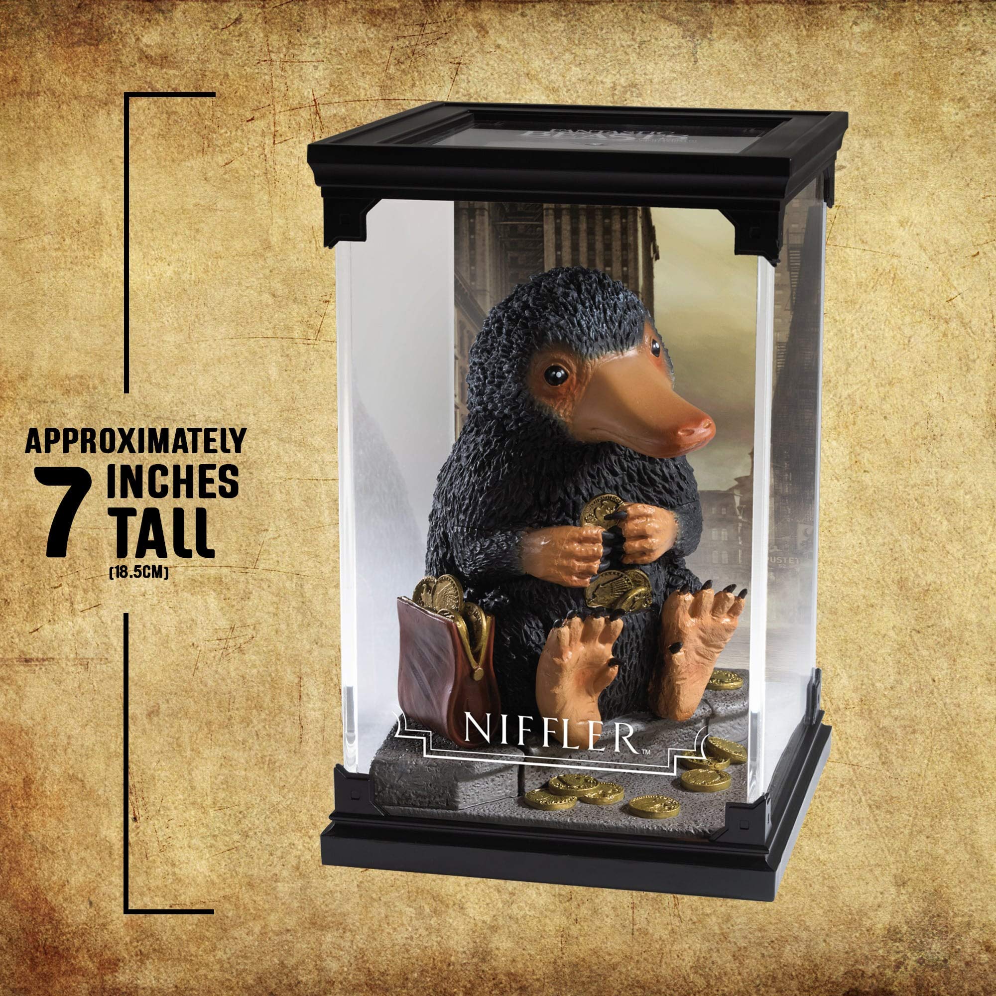 The Noble Collection Niffler display case keeps the figure protected.