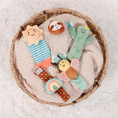 The Peanutshell gift-ready newborn toy set suits baby showers.