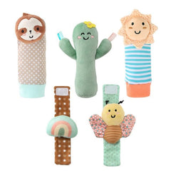 The Peanutshell sock rattle pair with high-contrast patterns for early visual focus.