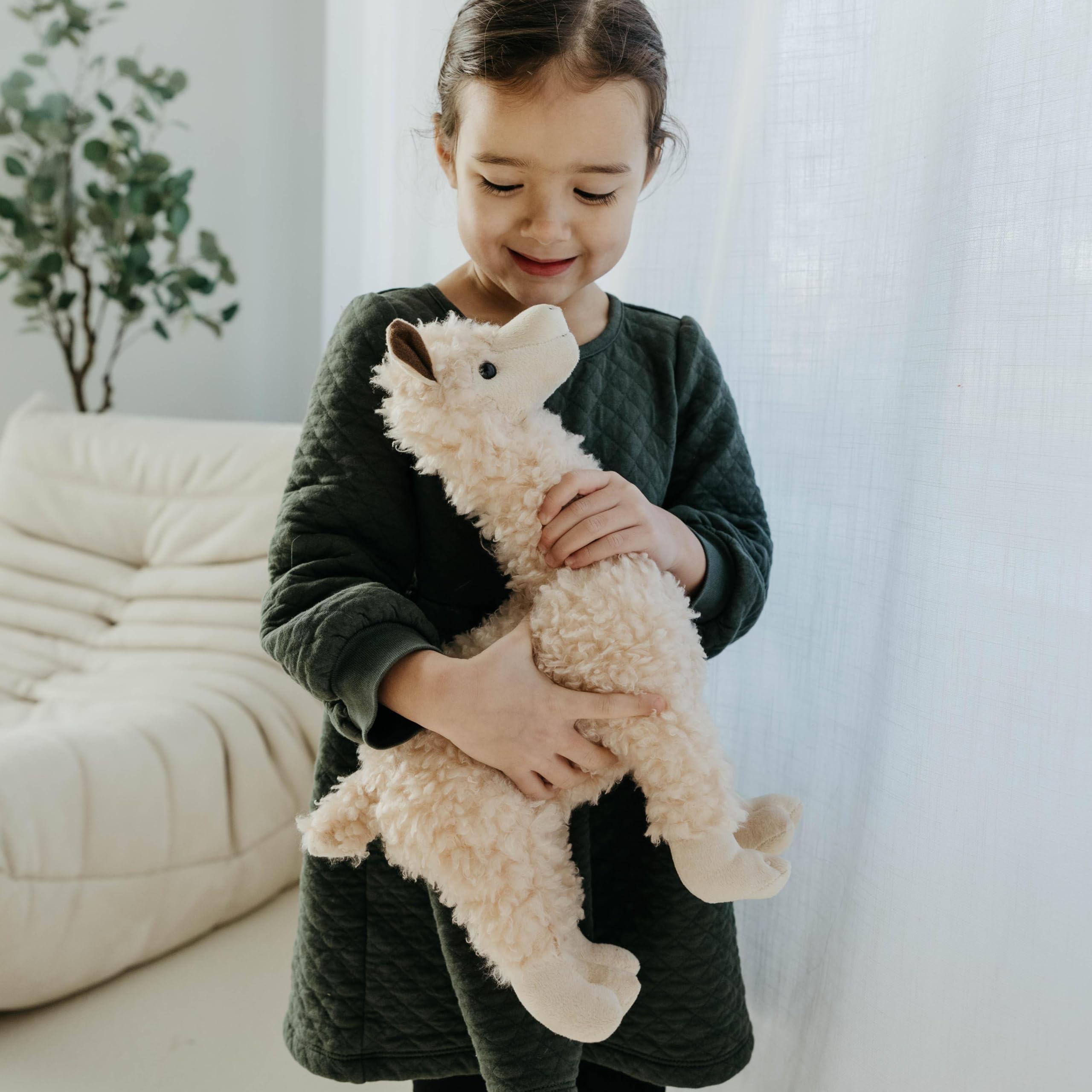 The Petting Zoo alpaca plushie makes a thoughtful toddler gift for birthdays and holidays.