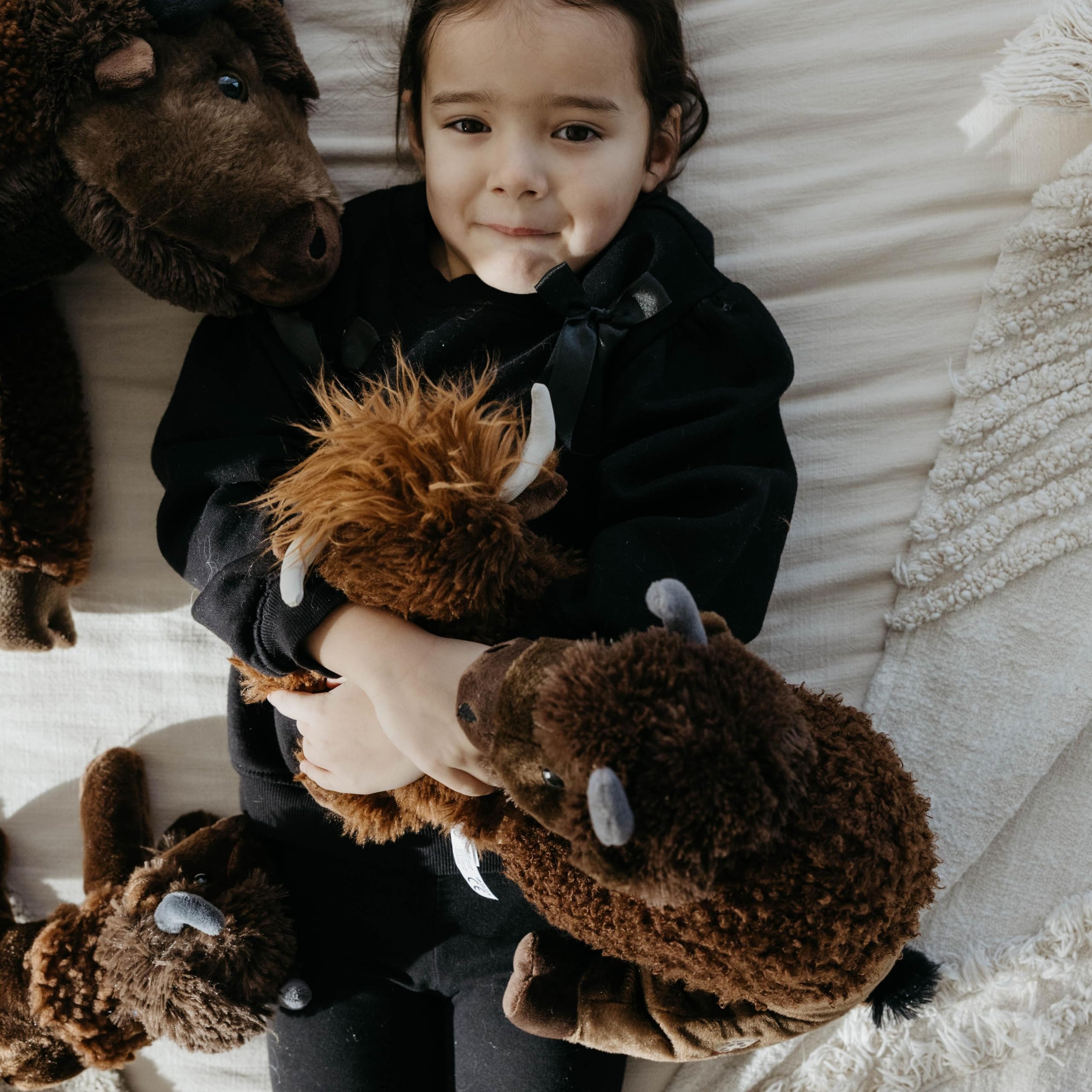The Petting Zoo Eco-friendly plush made from recycled bottles with a friendly look.