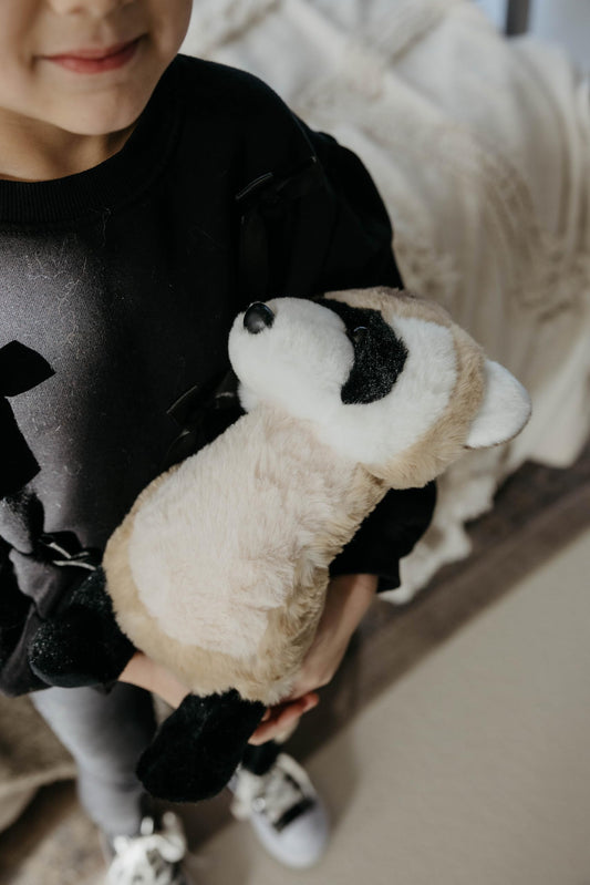 The Petting Zoo black-footed ferret plushie side view as a cuddly companion.