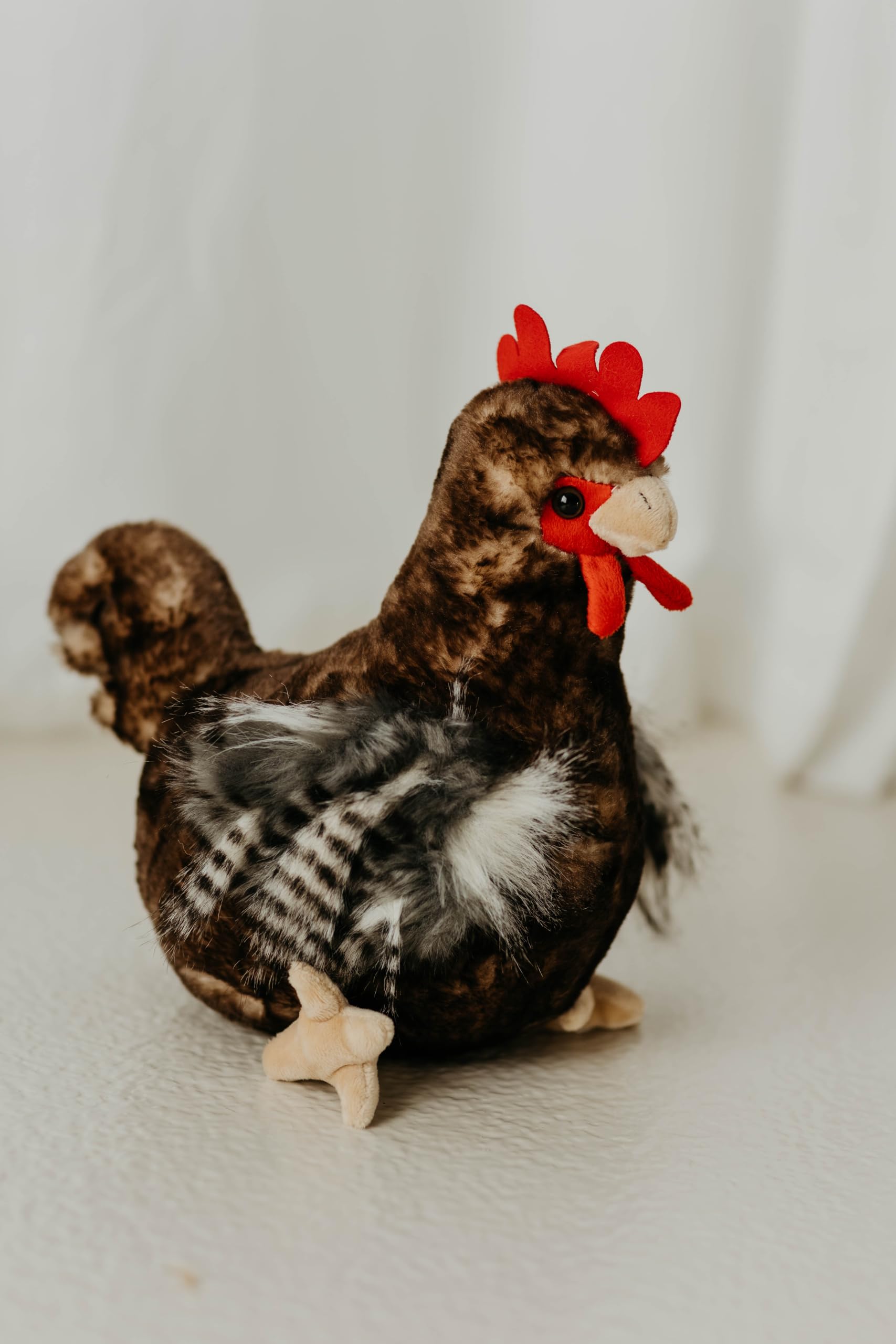 The Petting Zoo chicken plush for kid playtime and comfort.