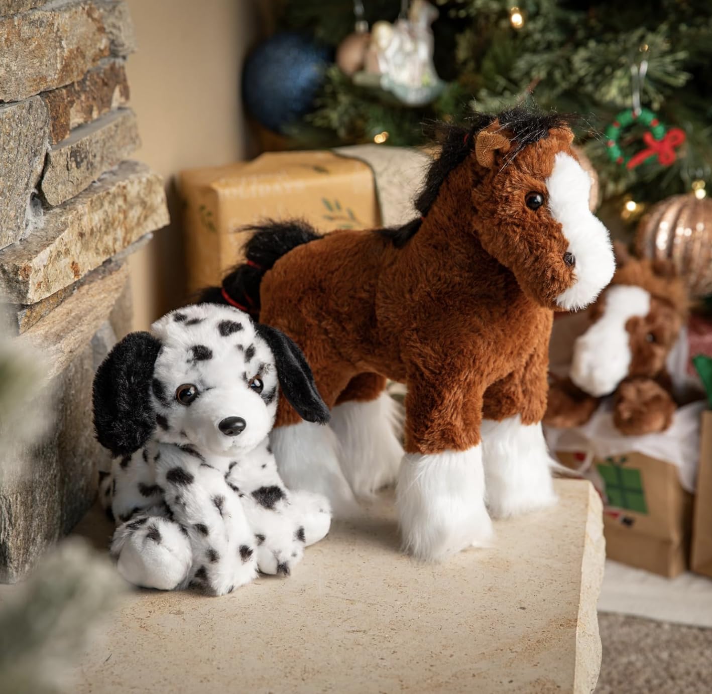 The Petting Zoo Dalmatian plush in a sitting pose supports easy posing for play.
