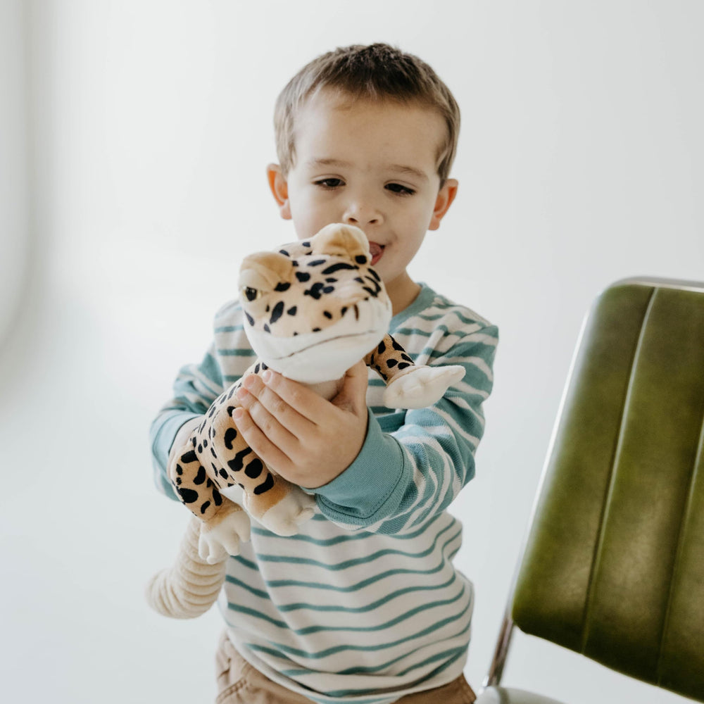 The Petting Zoo leopard gecko plush, close-up face, inviting comforting snuggles at bedtime.