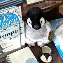 The Petting Zoo Penguin Chick stuffed animal, close-up nose, features cute button nose and durable feel.