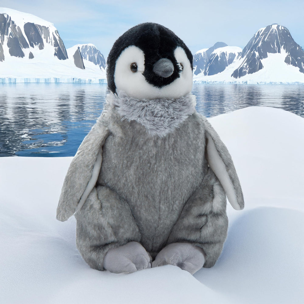 The Petting Zoo Penguin Chick stuffed animal, side view, perfect travel companion for kids' adventures.