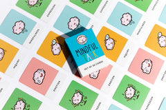 The School of Mindfulness emotion cards closeup highlights feelings cues.