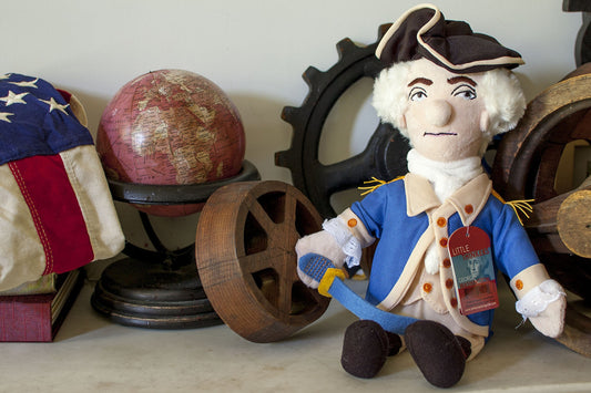 The Unemployed Philosophers Guild George Washington doll with black tri-corner hat—playful history-inspired decor.