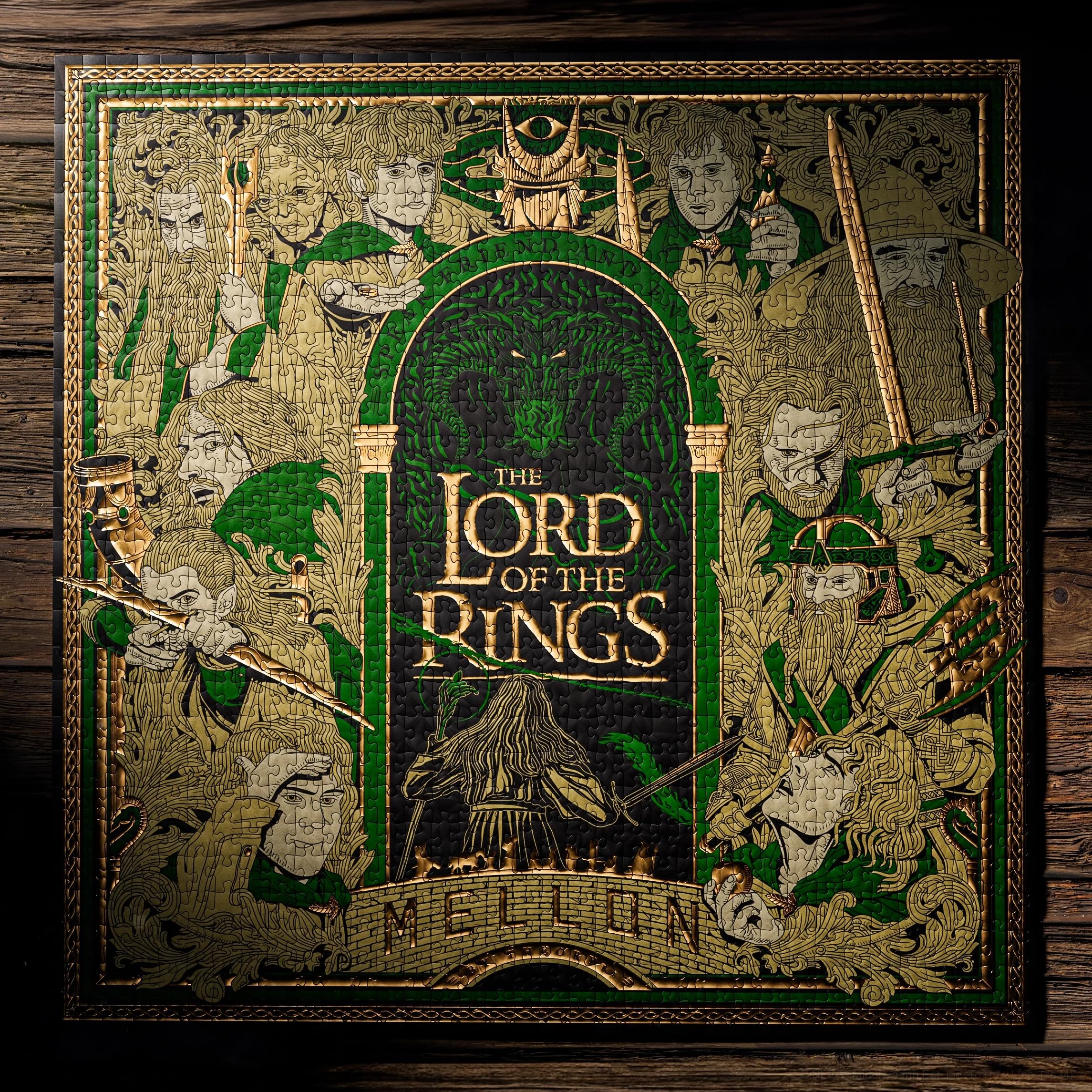 theory11 lord of the rings puzzle foil pieces sparkle with gold and green accents