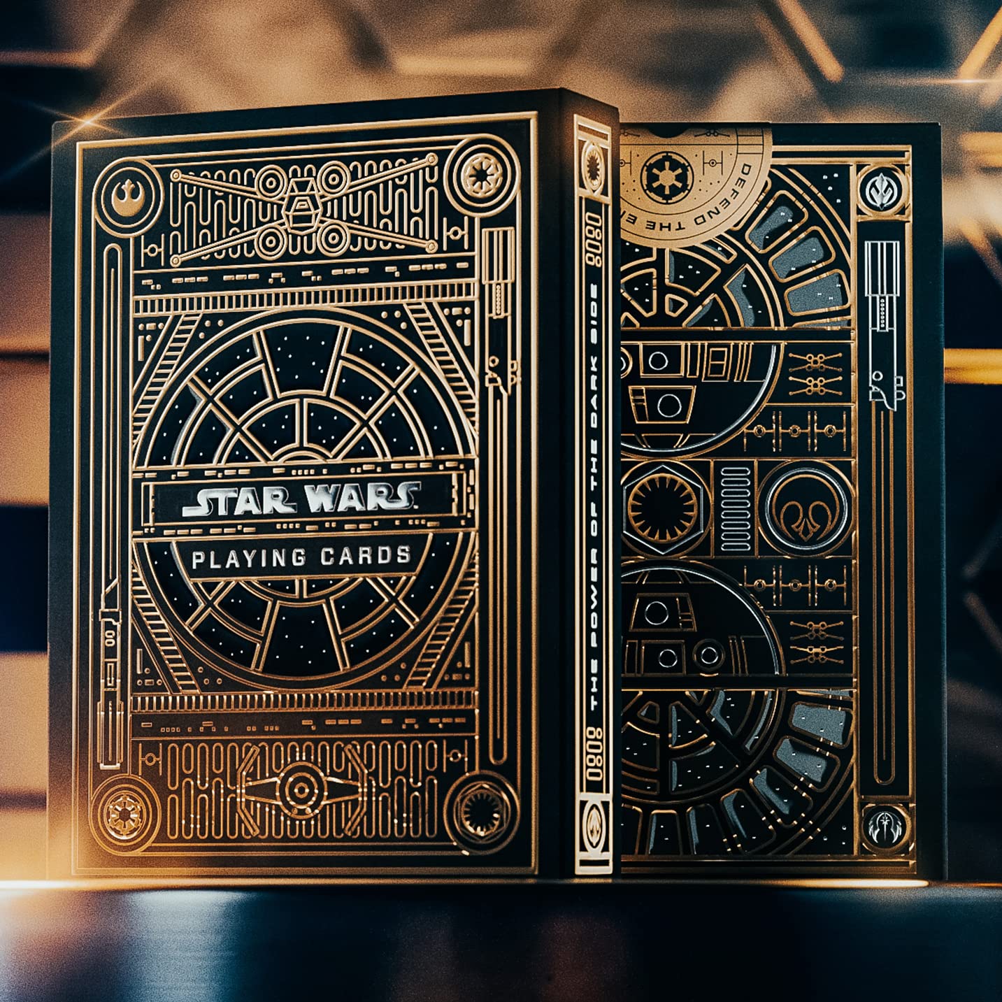 theory11 Star Wars gold foil back packaging evokes imperial windows and galactic awe.