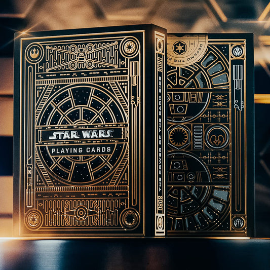 theory11 Star Wars gold foil back packaging evokes imperial windows and galactic awe.