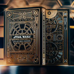 theory11 Star Wars gold foil back packaging evokes imperial windows and galactic awe.