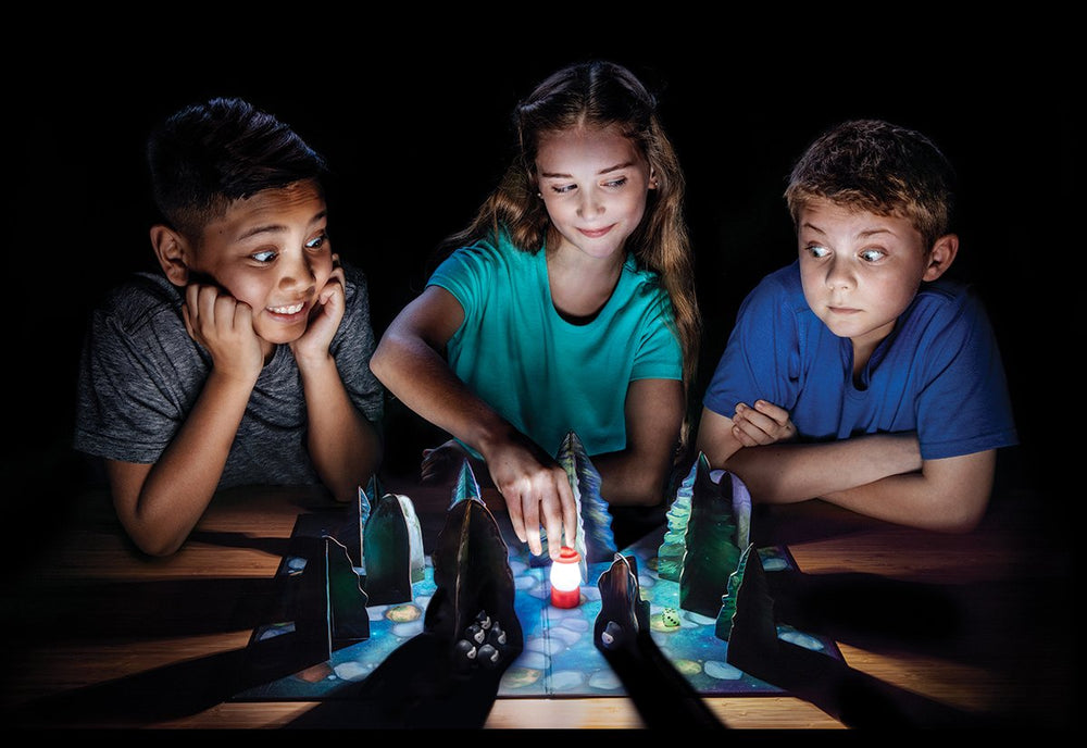 ThinkFun Shadows in the Forest mini lantern with batteries adds atmospheric play