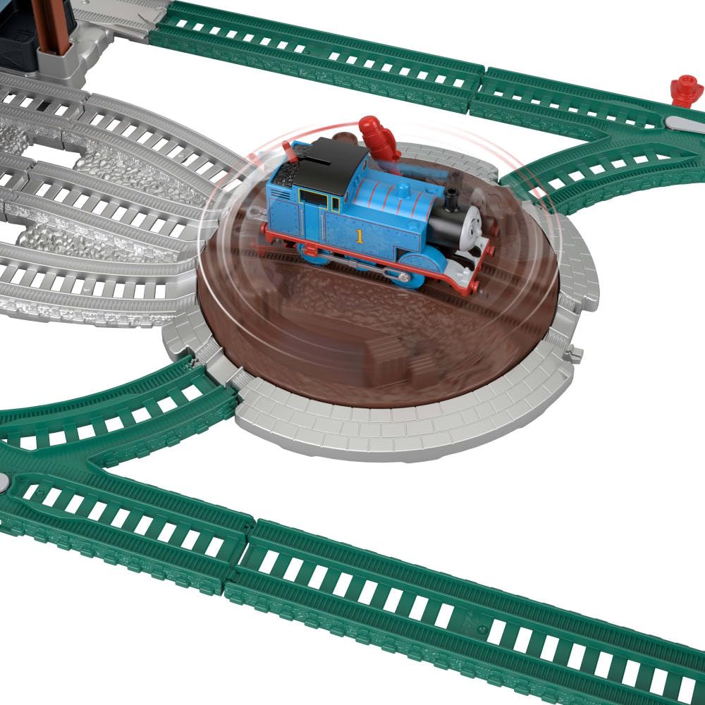 Thomas & Friends barrels launch onto depot roof enhances cause-and-effect play.