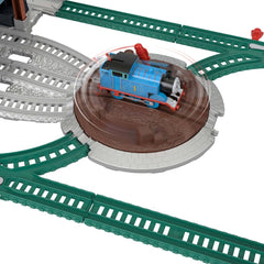 Thomas & Friends barrels launch onto depot roof enhances cause-and-effect play.