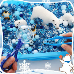 Thyle Winter Polar Sensory Bin blue pom-poms invite sorting and imaginative Arctic play.